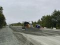 На Корсаковской трассе с 11 по 13 км приступили к устройству дорожной одежды